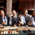 guys sitting around a poker table